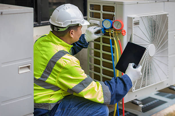 Professional Heat Pump Repair technician working in Salemburg, NC